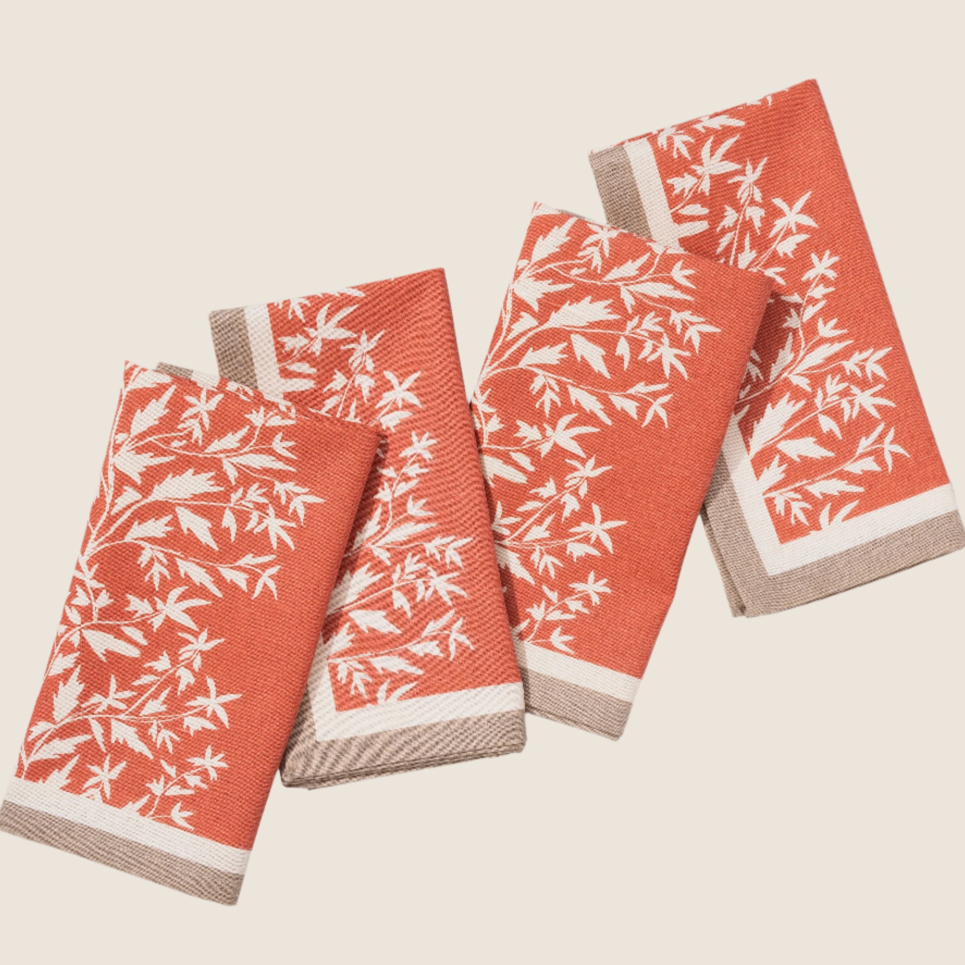 collection of four primrose venu napkins photographed on a white marble background